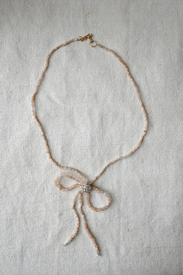 Necklaces Jacki Holland Peach Moonstone Bow Necklace