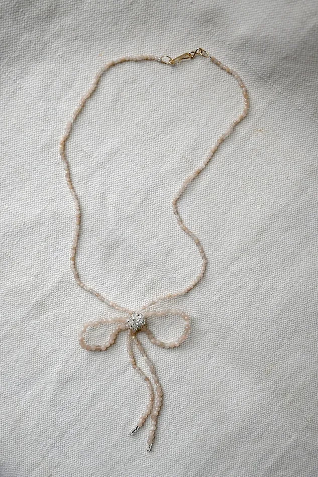 Necklaces Jacki Holland Peach Moonstone Bow Necklace